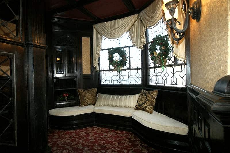 A window seat in the bay of the 870 West Fourth Street foyer