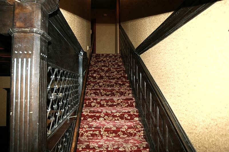 The carved staircase at 870 West Fourth Street